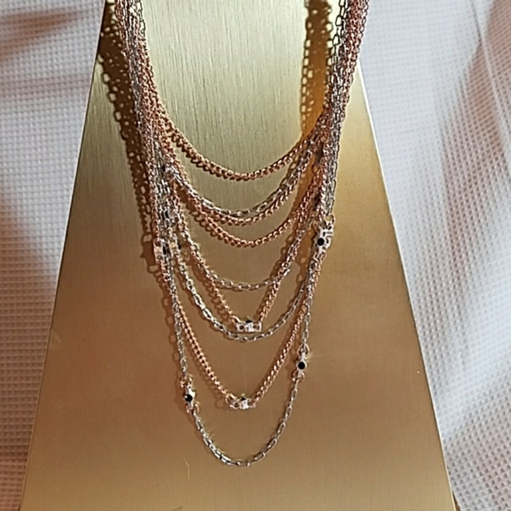 Multi necklace with lill stars with black gems